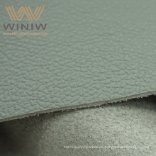 El grueso sintético de la tela 1.2mm 1.4mm de la tapicería del asiento del cuero de coche de Eco Dakota modifica para requisitos particulares